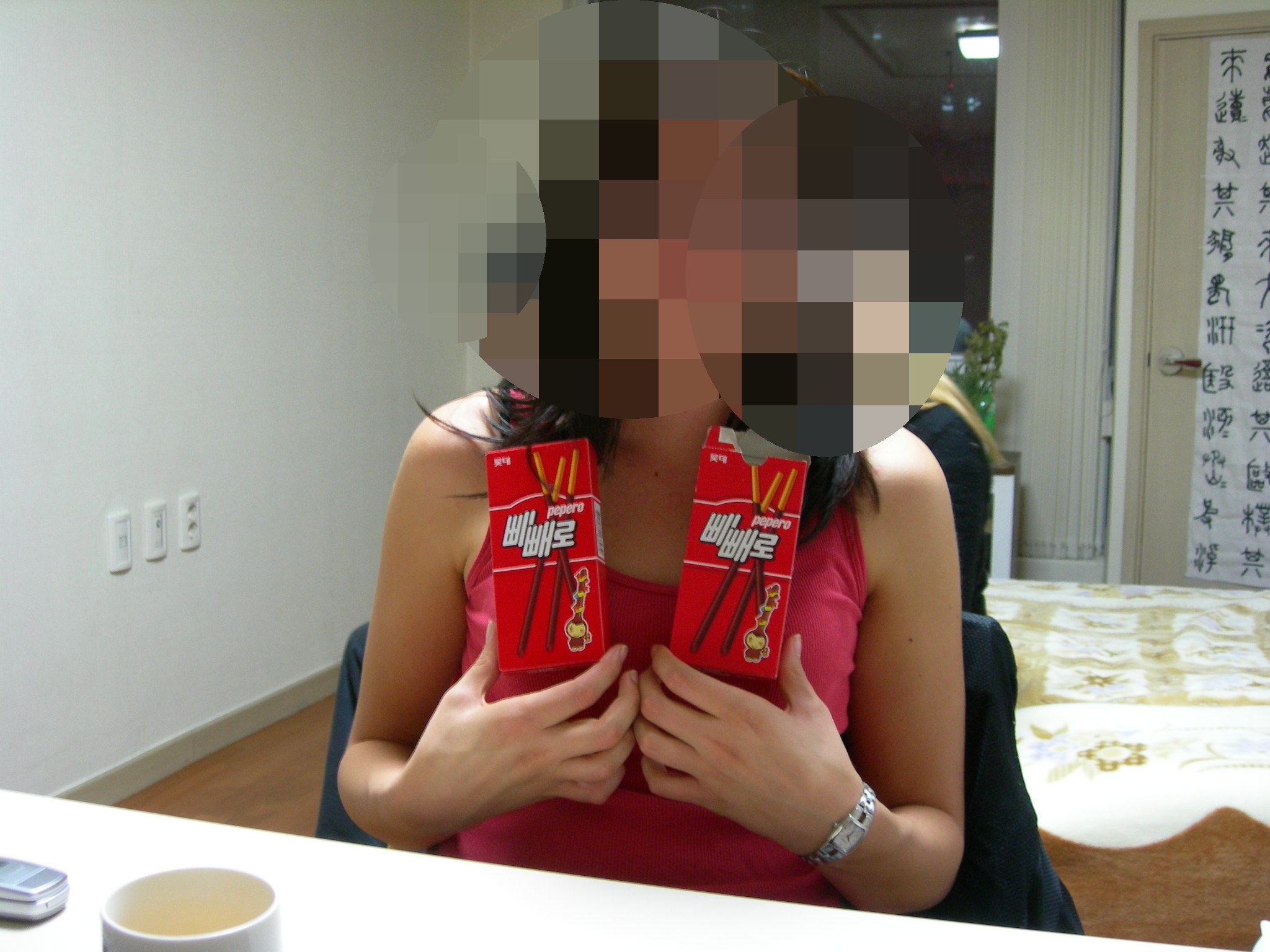 Robin holding 2 boxes of Pepero