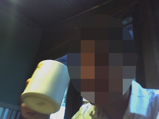 JL holding a mug during his visit to Joa in Japan